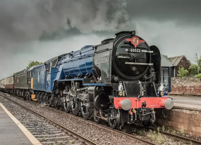 17pts-N_Hubner-Colour_Print-Blue_Peter_running_through_Wigton_station